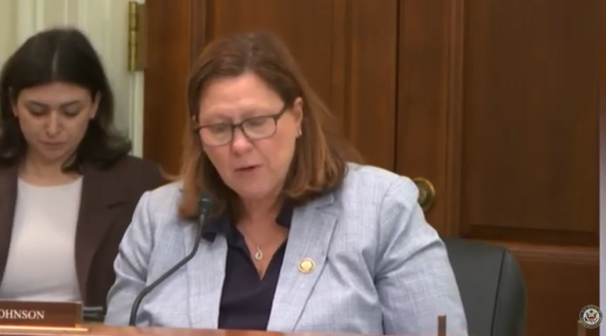 Johnson speaks during a House Administration Committee  markup urging passage of her VOTE Act.